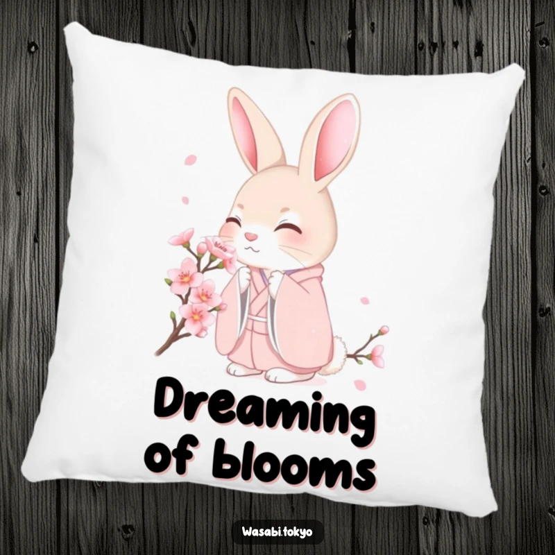 Funny shy rabbit in a pink kimono amidst cherry blossoms on a soft pillow, providing comfort and gentle humor, a charming funny gift.